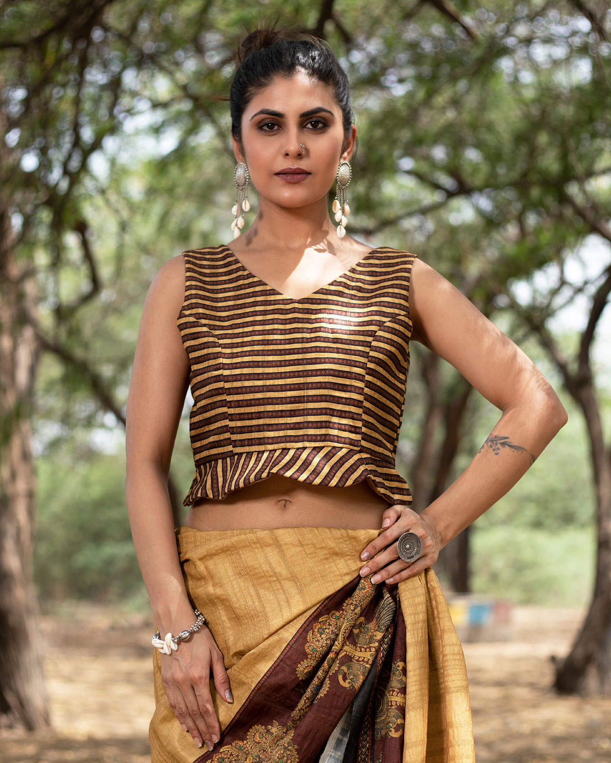 Stripes Printed Silk Peplum Blouse