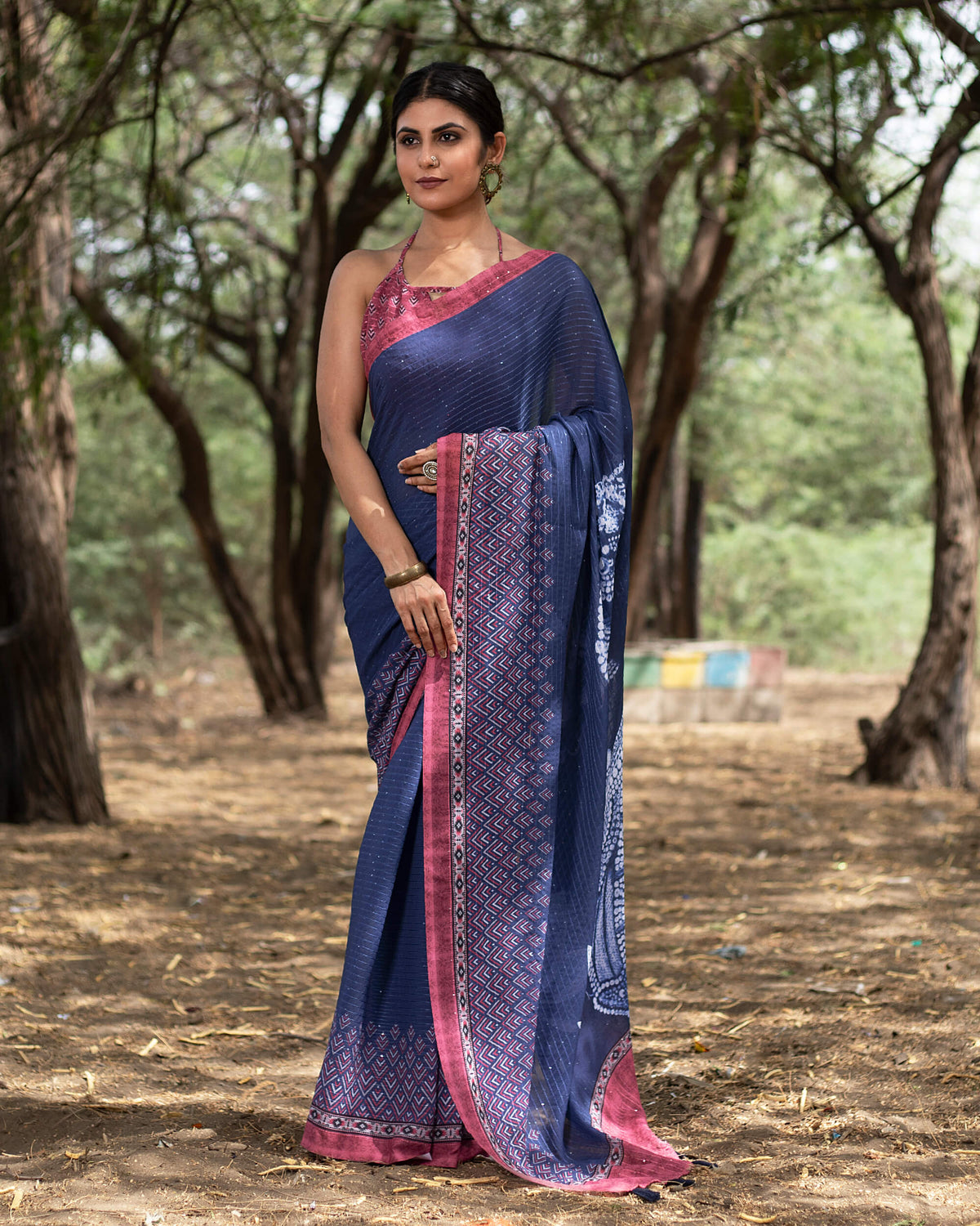 Navy Blue And Cannon Pink Quirky Pattern Premium Sequins Georgette Saree With Tassels