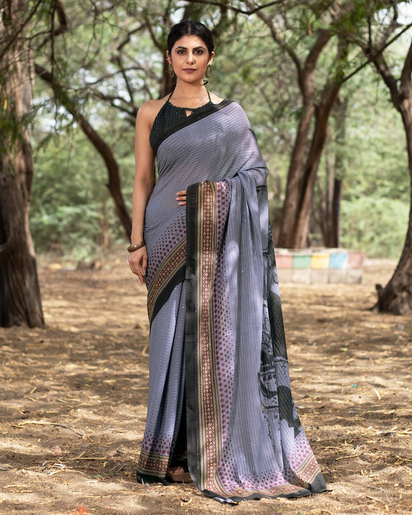 Independence Blue And Black Quirky Pattern Premium Sequins Georgette Saree With Tassels