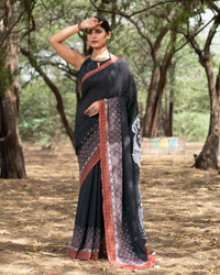 Black And White Quirky Pattern Premium Sequins Georgette Saree With Tassels