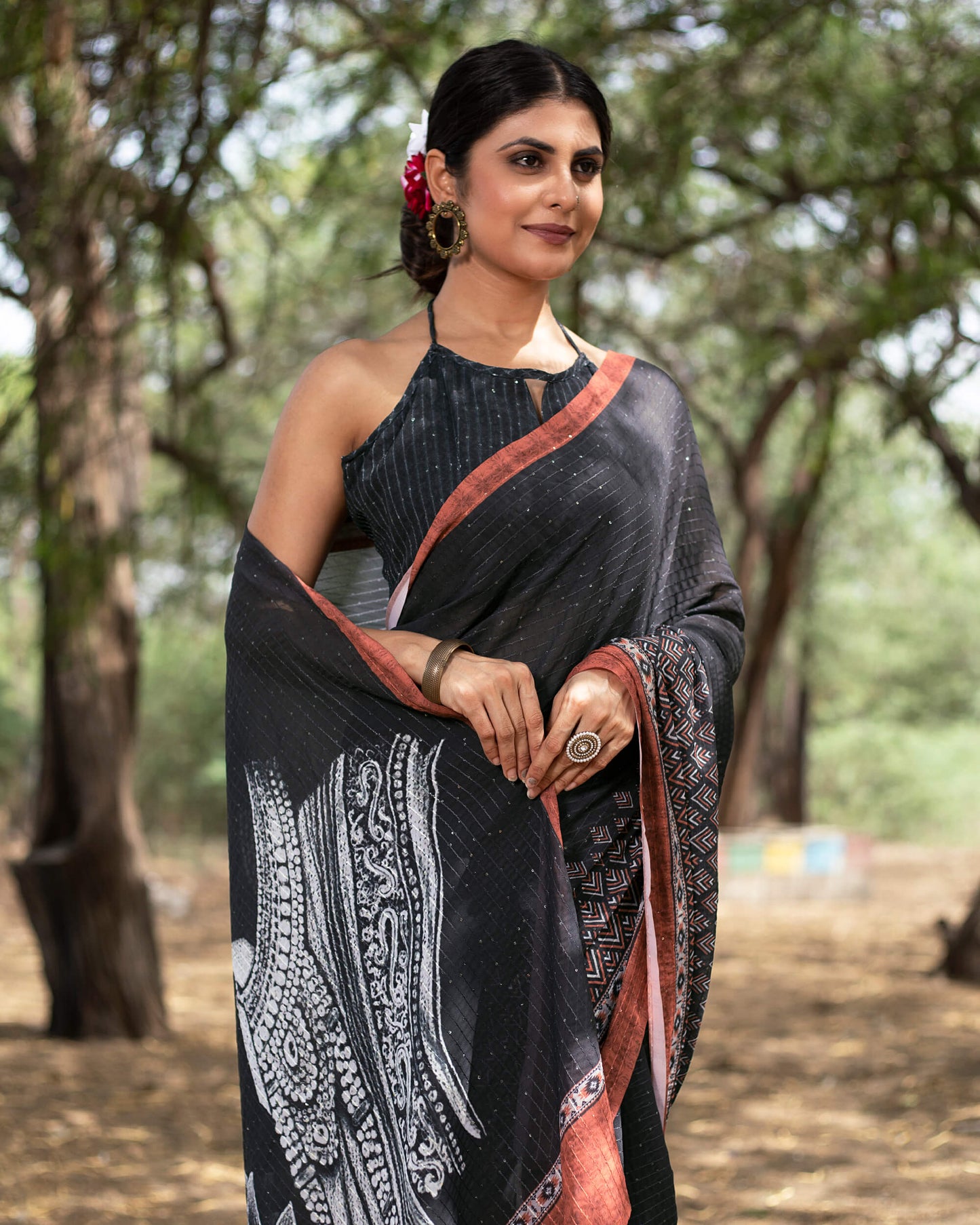 Black And White Quirky Pattern Premium Sequins Georgette Saree With Tassels