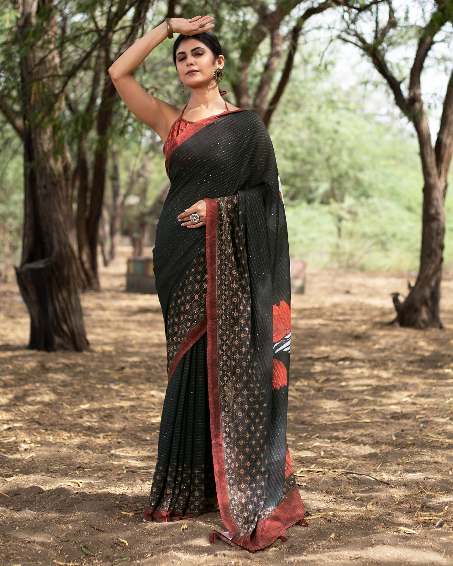 Black And Brick Red Quirky Pattern Premium Sequins Georgette Saree With Tassels