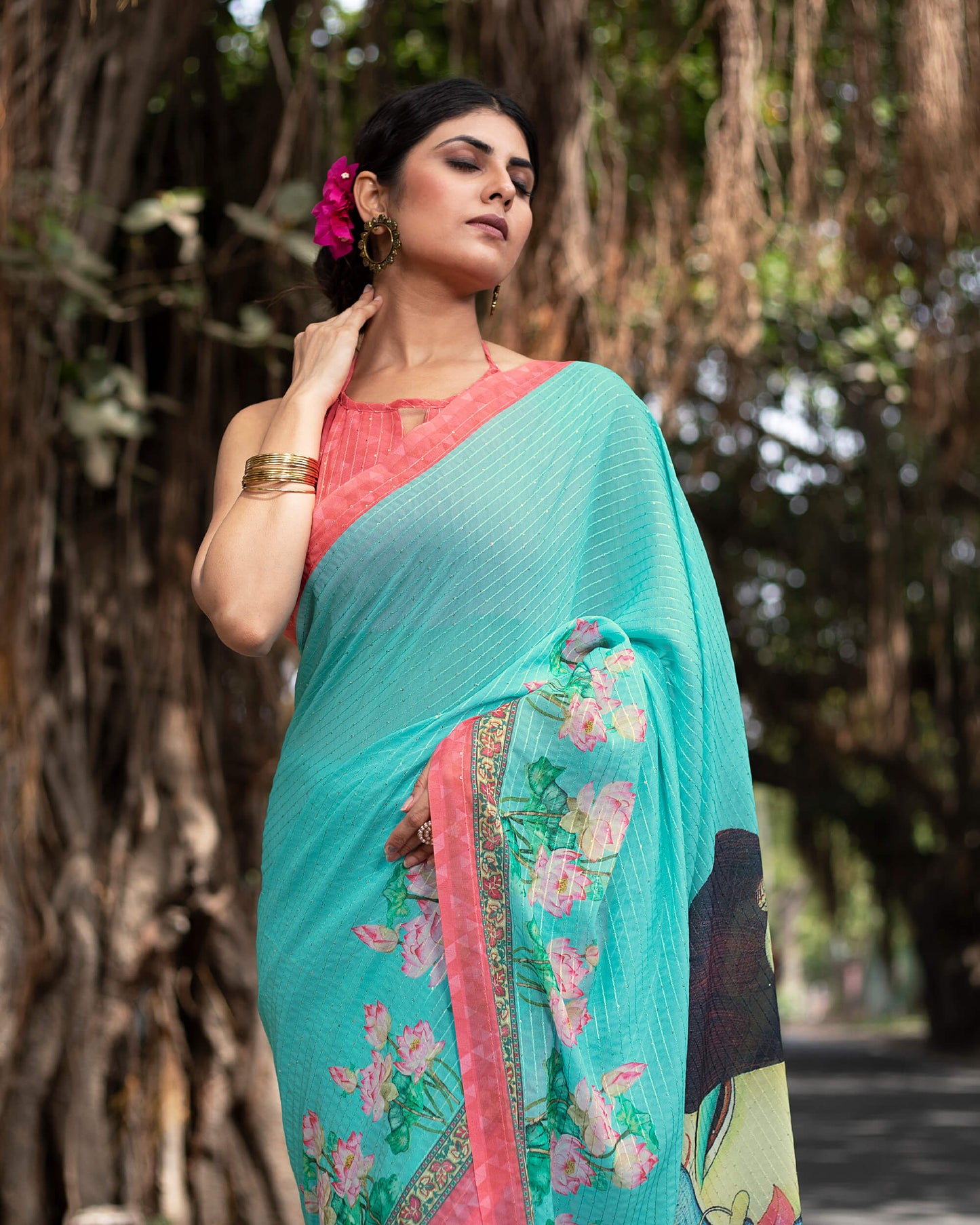 Turquoise Blue And Pink Quirky Pattern Premium Sequins Georgette Saree With Tassels