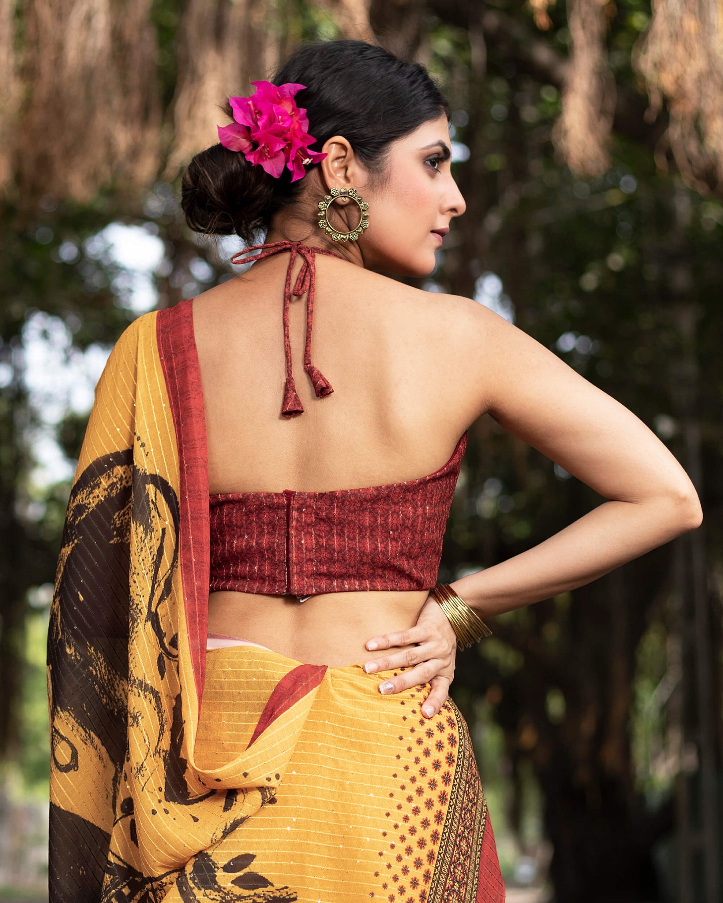 Merigold Yellow And Black Quirky Pattern Premium Sequins Georgette Saree With Tassels