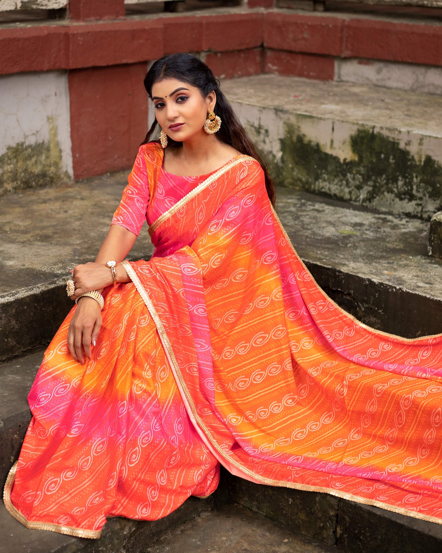 Candy Red And Carrot Orange Bandhani Pattern Digital Print Crepe Silk Saree With Sequins Lace