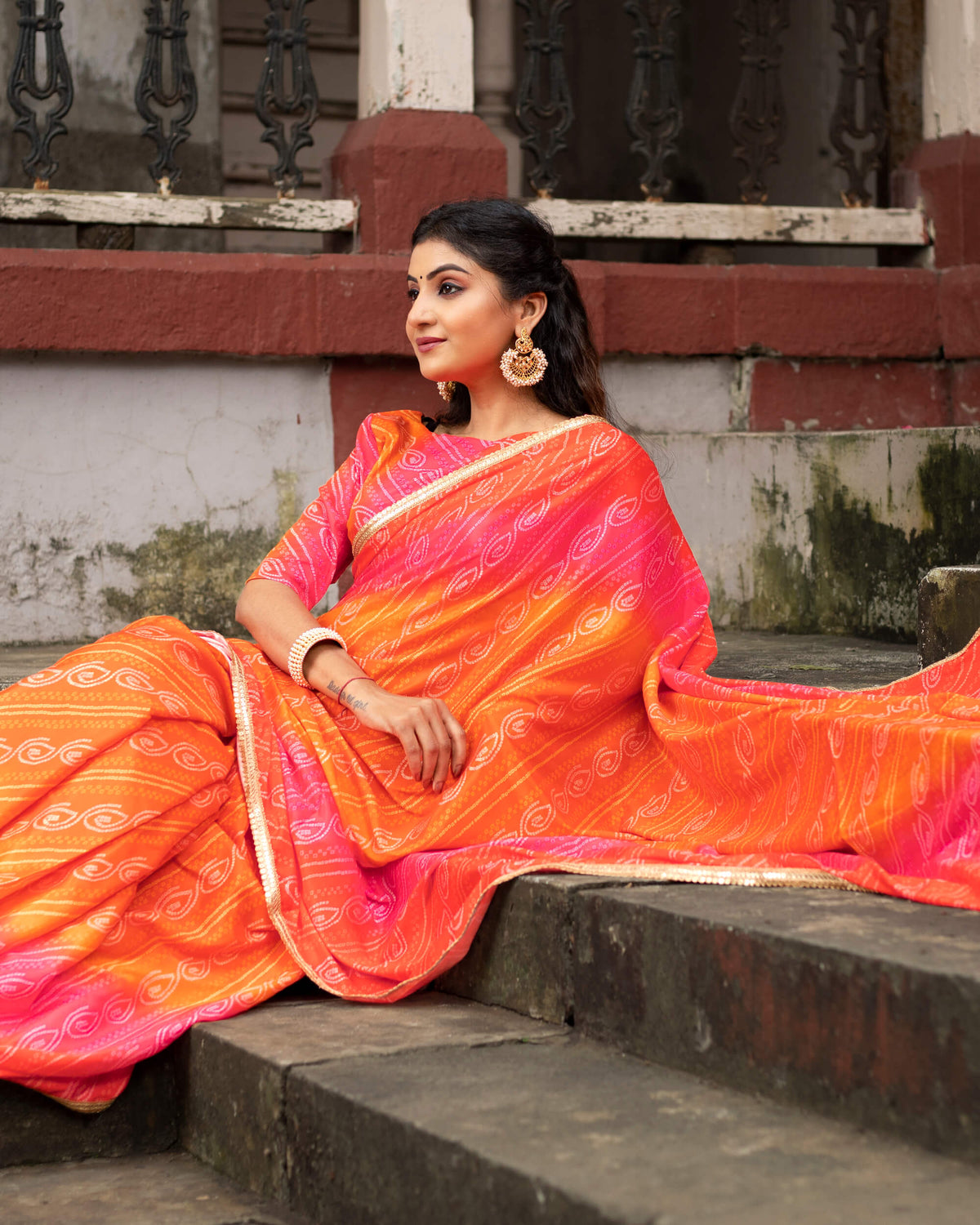 Candy Red And Carrot Orange Bandhani Pattern Digital Print Crepe Silk Saree With Sequins Lace