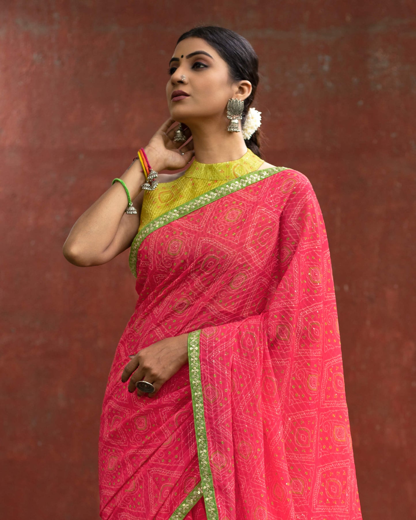 Cerise Pink And Green Bandhani Pattern Digital Print Sequins Georgette Saree With Lace Border