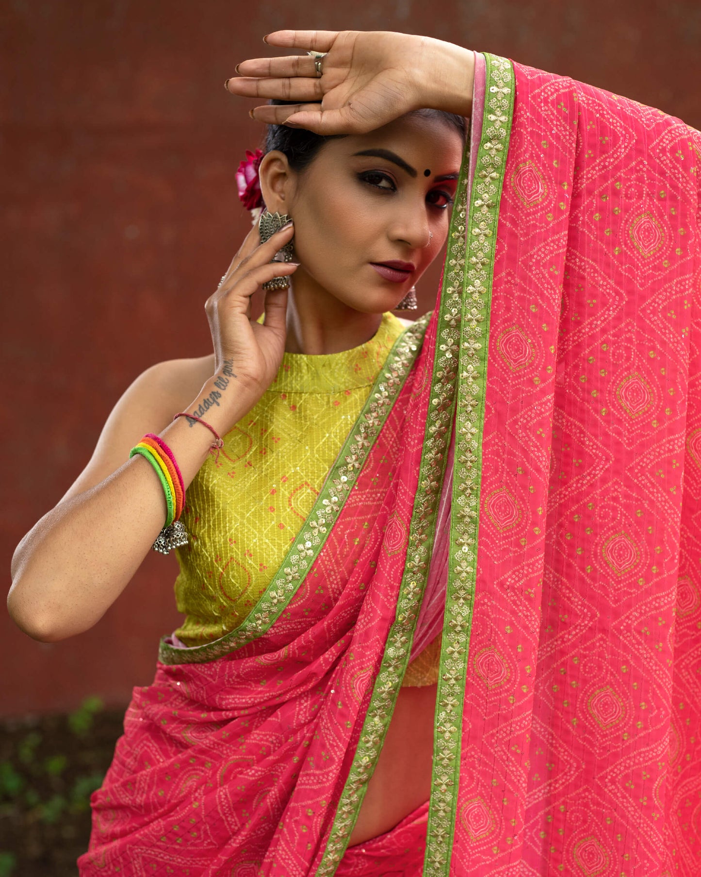 Cerise Pink And Green Bandhani Pattern Digital Print Sequins Georgette Saree With Lace Border