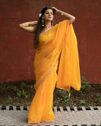 Fire Yellow Plain Liquid Organza Saree With Lace Border
