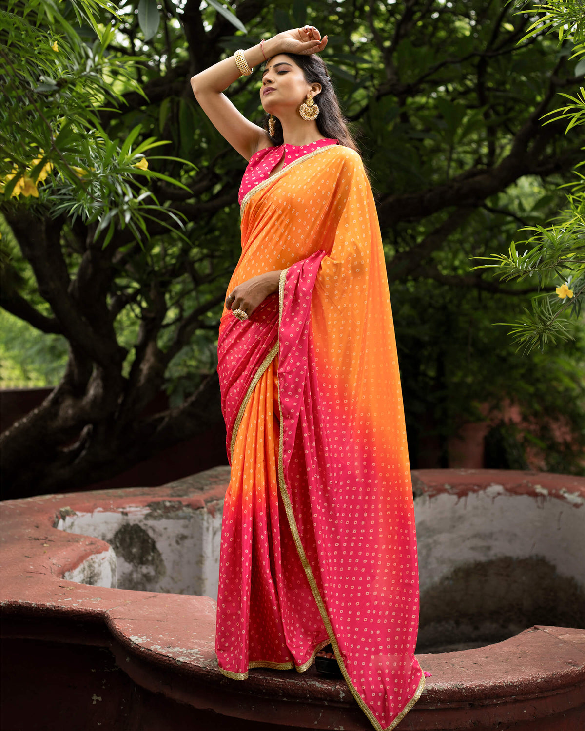 Apricot Orange And Magenta Pink Bandhanii Pattern Digital Print Crepe Silk Saree With Lace Border