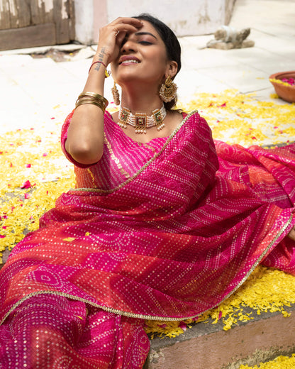 Magenta Pink And Red Bandhanii Pattern Kota Doria Saree With Lace Border