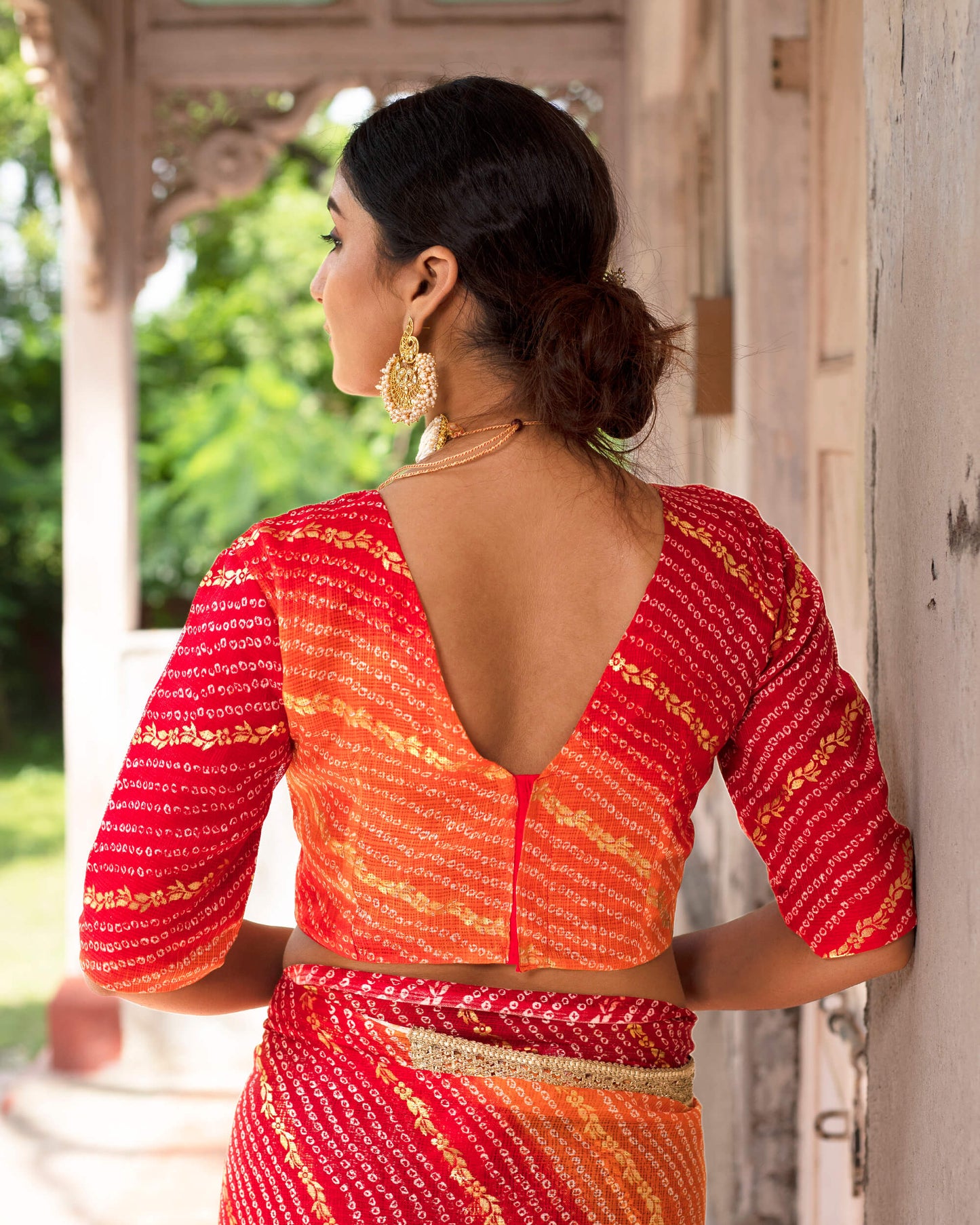 Burnt Orange And Red Bandhani Pattern Kota Doria Saree With Lace Border