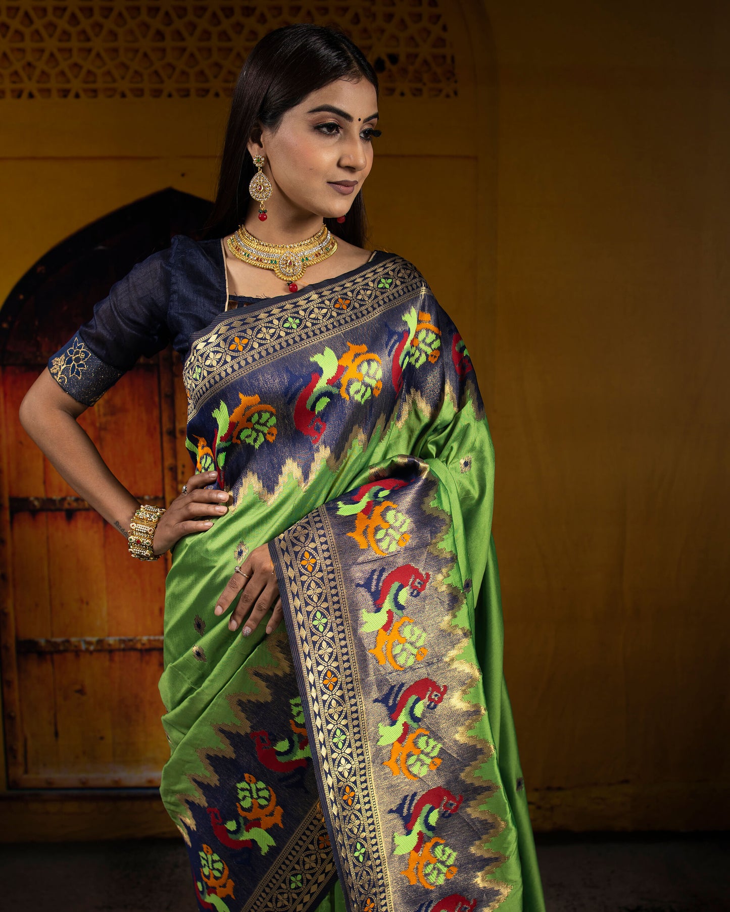 Parakeet Green And Navy Blue Booti Pattern Zari Jacquard Bordered Premium Banarasi Silk Saree With Blouse