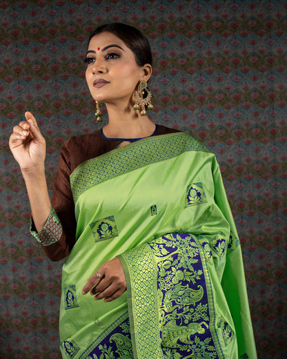 Parakeet Green And Navy Blue Floral Pattern Zari Jacquard Bordered Premium Banarasi Silk Saree With Blouse