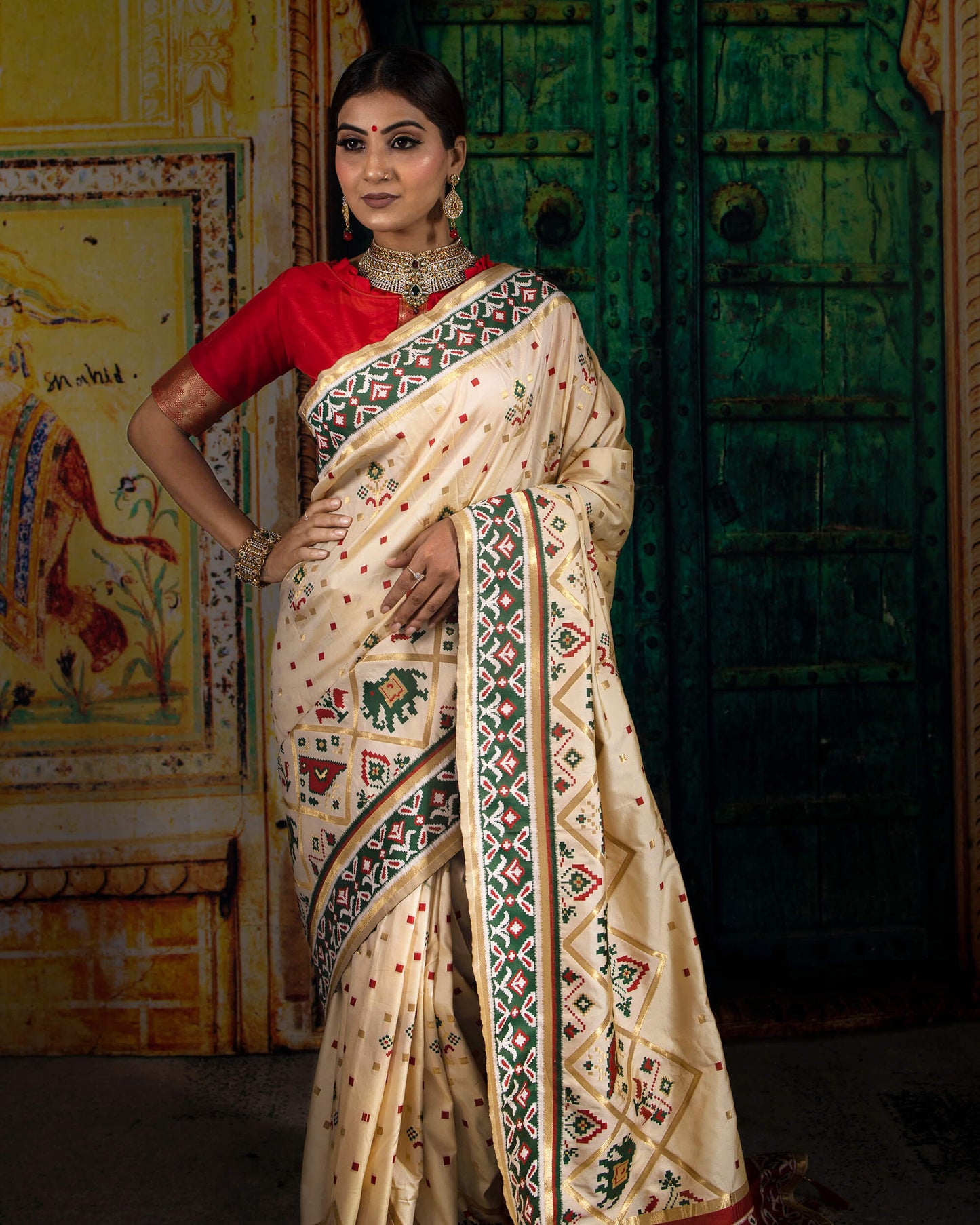 Cream And Green Patola Pattern Zari Jacquard Bordered Premium Banarasi Silk Saree With Blouse