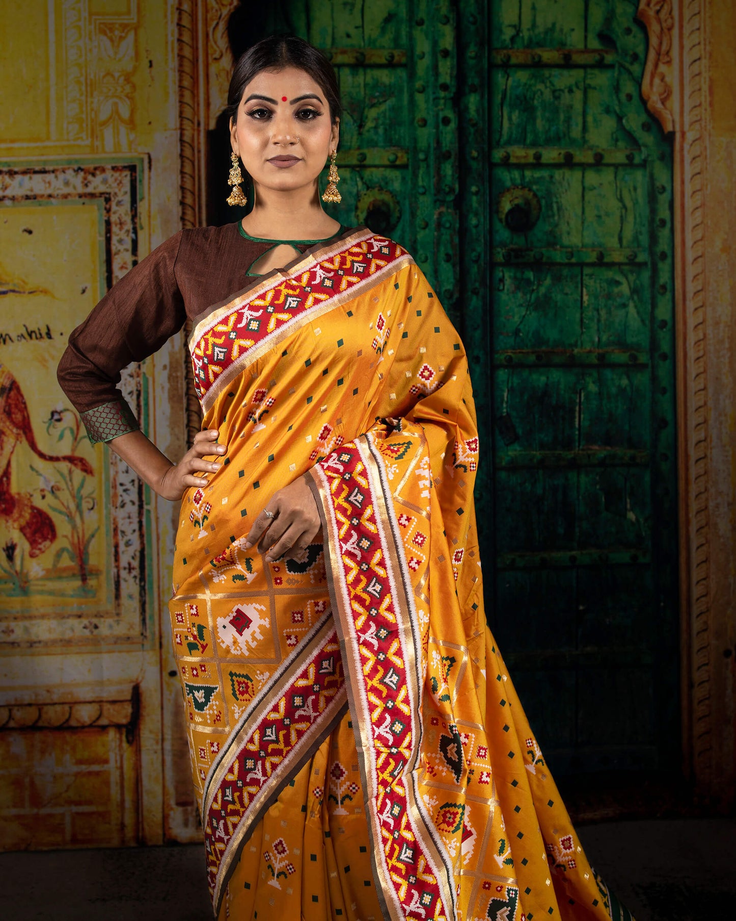 Fire Yellow And Red Patola Pattern Zari Jacquard Bordered Premium Banarasi Silk Saree With Blouse