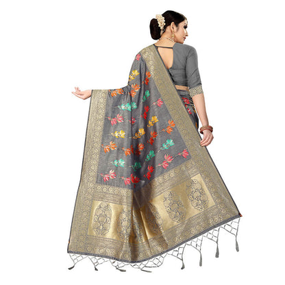 Anchor Grey And Fuchsia Floral Pattern Zari Jacquard Borderd Art Tussar Silk Premium Saree With Tassels