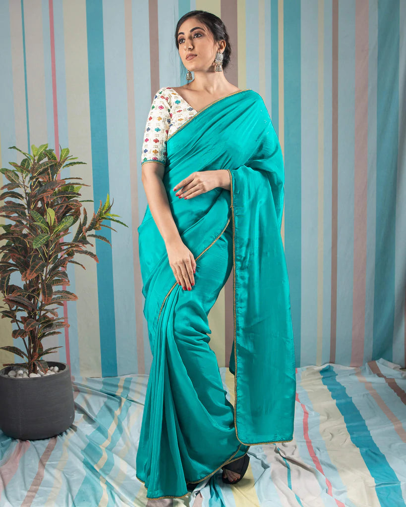 Turquoise Plain Viscose Uppada Silk Saree With Lace Border