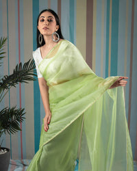 Basil Green Plain Liquid Organza Saree With Pearl Work Lace Border