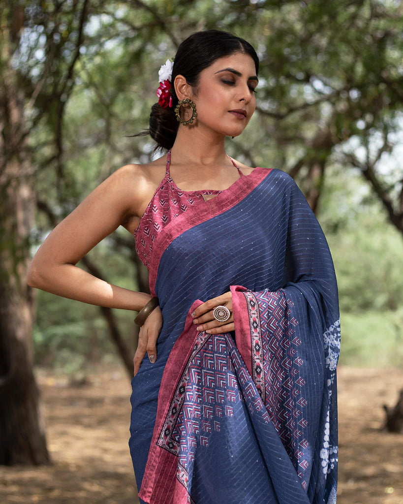 Navy Blue And Cannon Pink Quirky Pattern Premium Sequins Georgette Saree With Tassels