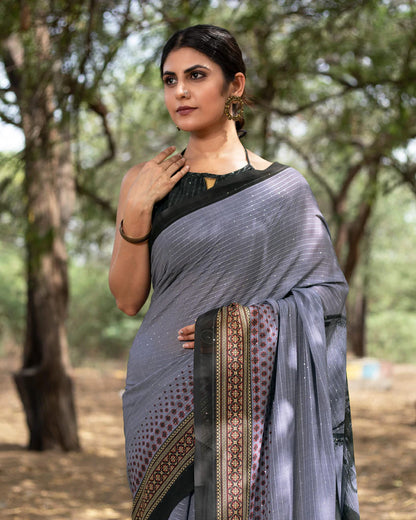 Independence Blue And Black Quirky Pattern Premium Sequins Georgette Saree With Tassels