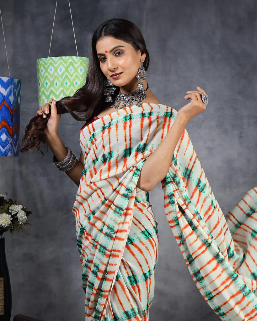 Off White And Orange Shiiborii Pattern Digital Print Georgette Saree With Tassels