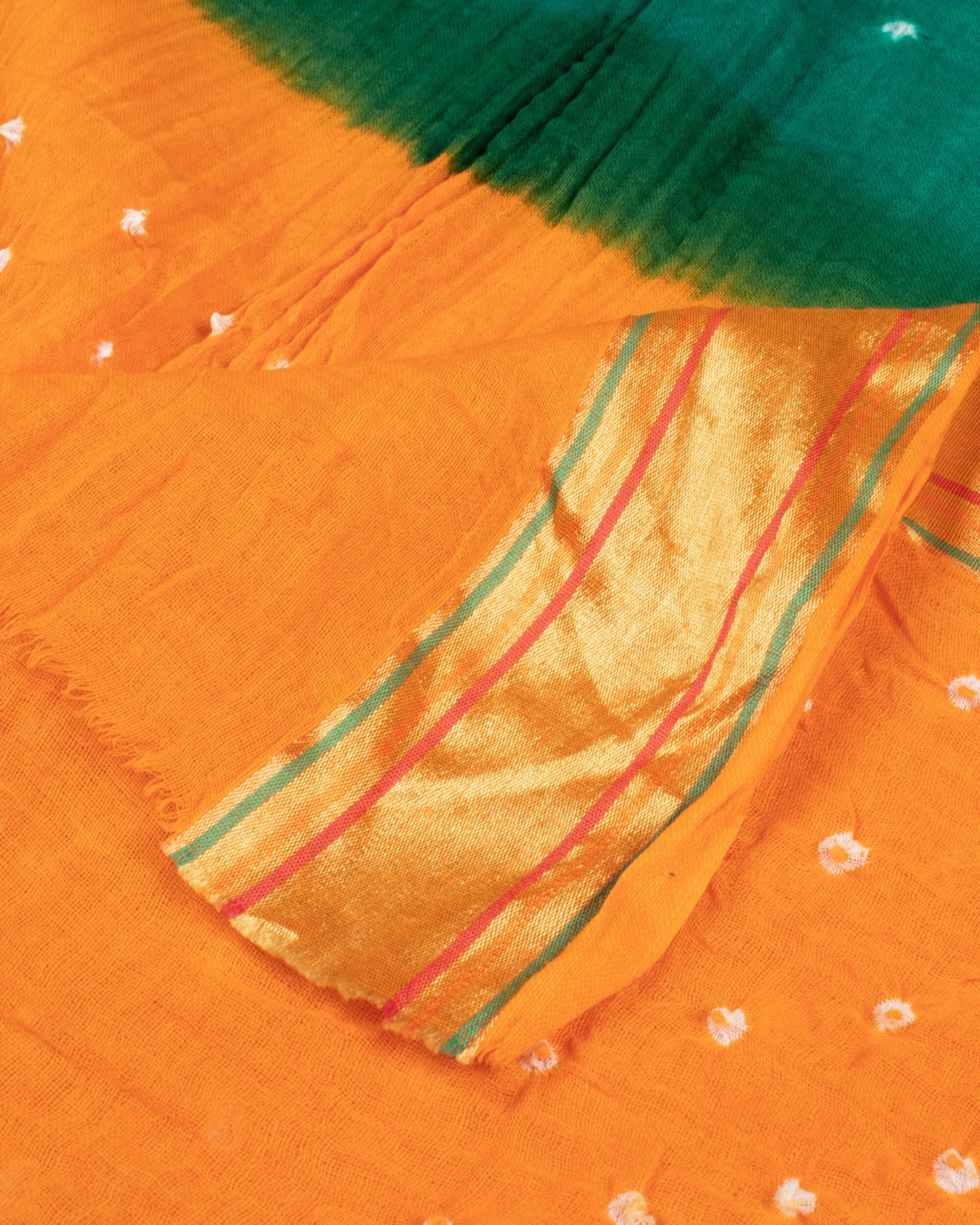 Honey Yellow And Green Kutchi Bandhani Foil Mirror Work Unstitched Cotton Suit With Zari Border Dupatta