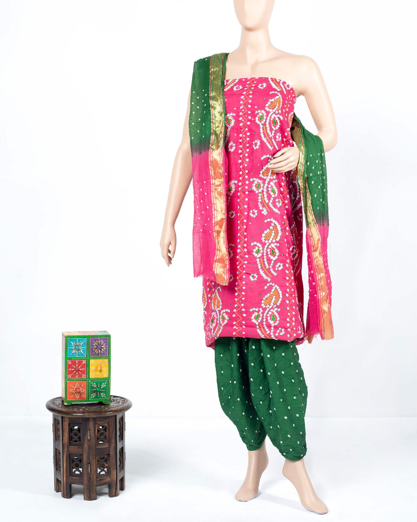 Punch Pink And Grass Green Kutchi Bandhani Foil Mirror Work Unstitched Cotton Suit With Zari Border Dupatta